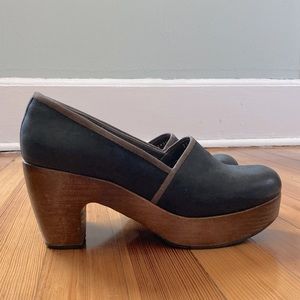 Coclico black leather clogs with brown leather detail, on wooden platform heel